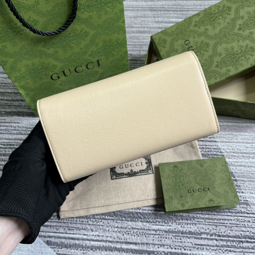 CONTINENTAL WALLET WITH GUCCI SCRIPT lIGHT YELLOW 7.5"W x 4"H x 1.4"D