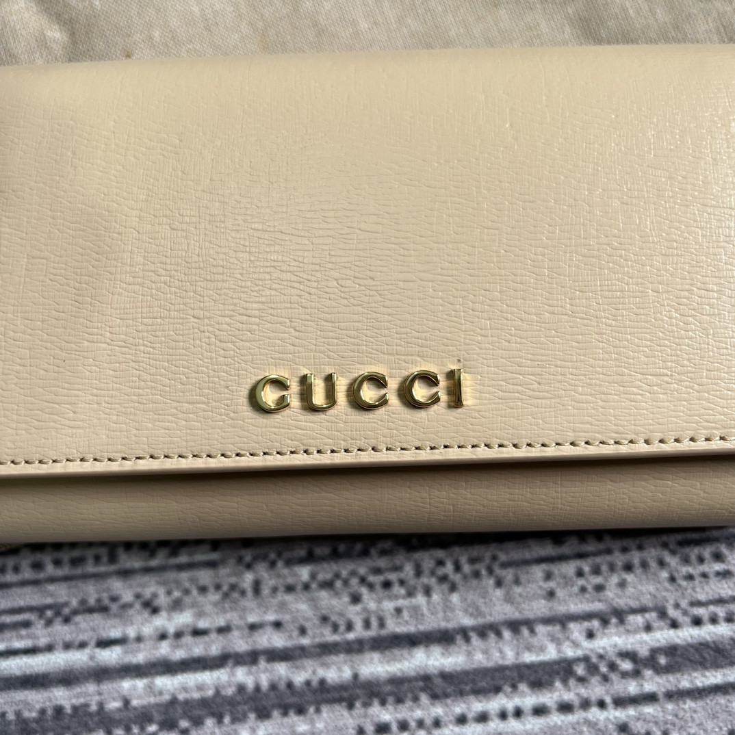 CONTINENTAL WALLET WITH GUCCI SCRIPT lIGHT YELLOW 7.5"W x 4"H x 1.4"D