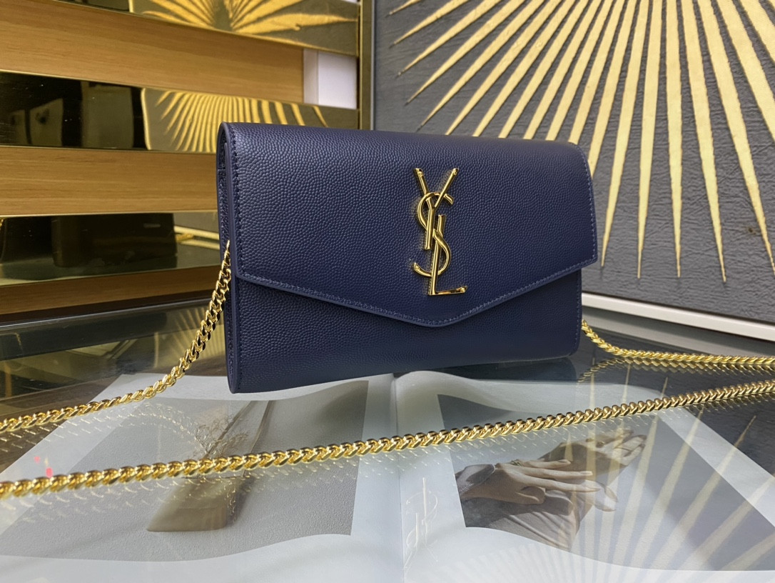 YSL UPTOWN CHAIN WALLET IN GRAIN DE POUDRE EMBOSSED LEATHER NAVY 7.5 X 4.7 X 1.2 INCHES
