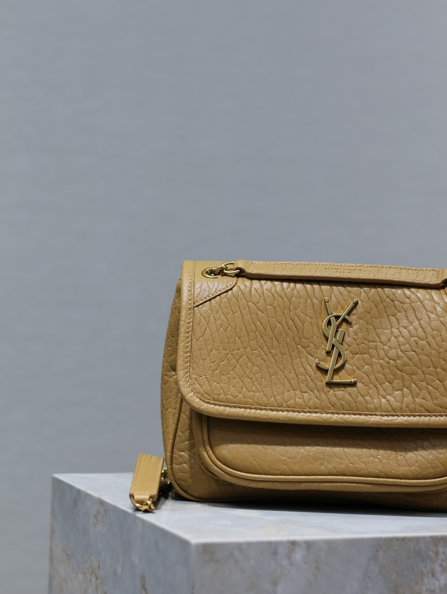 YSL NIKI BABY IN VINTAGE LEATHER DARK CORK 8.2 X 6 X 2.9 INCHES