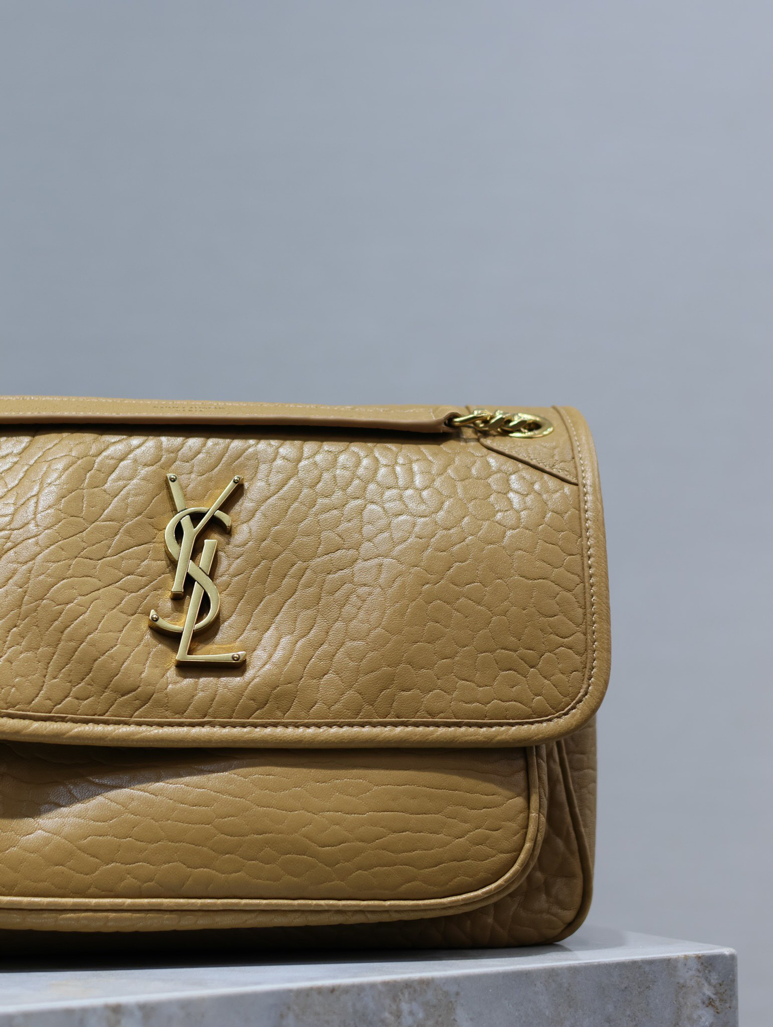 YSL NIKI MEDIUM IN VINTAGE LEATHER DARK CORK 11 X 7.8 X 3.3 INCHES