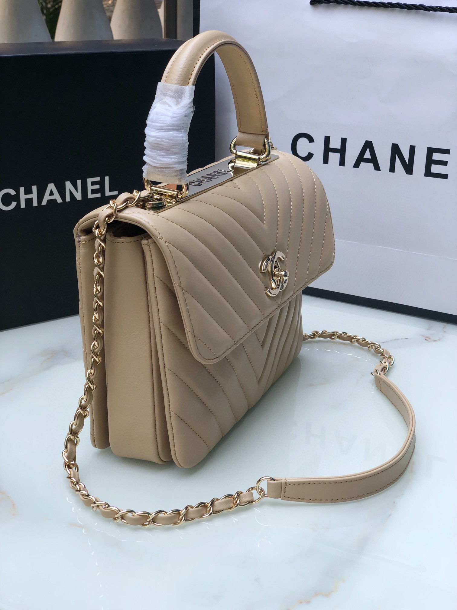 CHANEL FLAP BAG WITH TOP HANDLE BEIGE 6.6 × 9.8 × 4.7 in