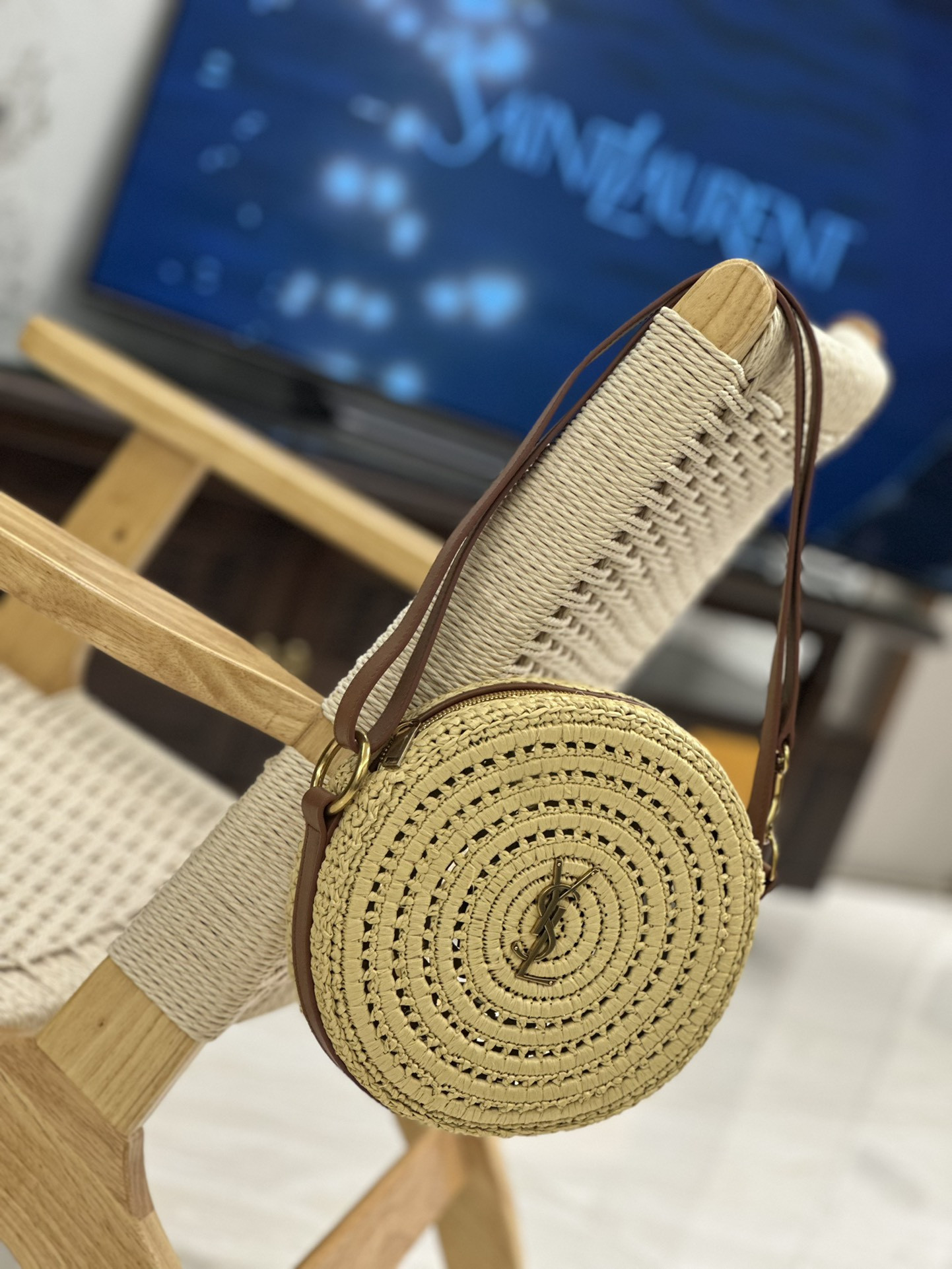 YSL ROUND BAG IN RAFFIA AND VEGETABLE-TANNED LEATHER Color Natural