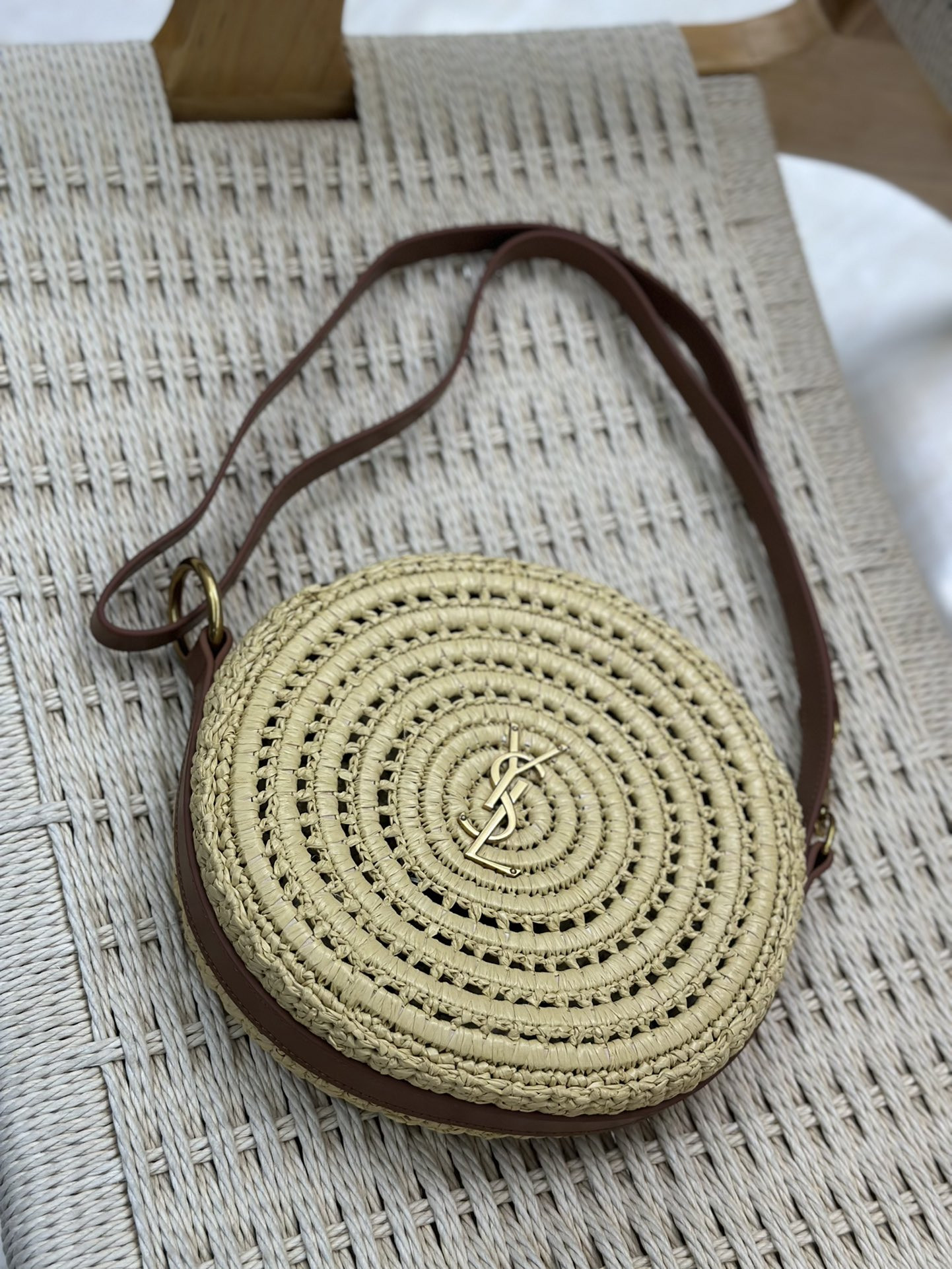 YSL ROUND BAG IN RAFFIA AND VEGETABLE-TANNED LEATHER Color Natural