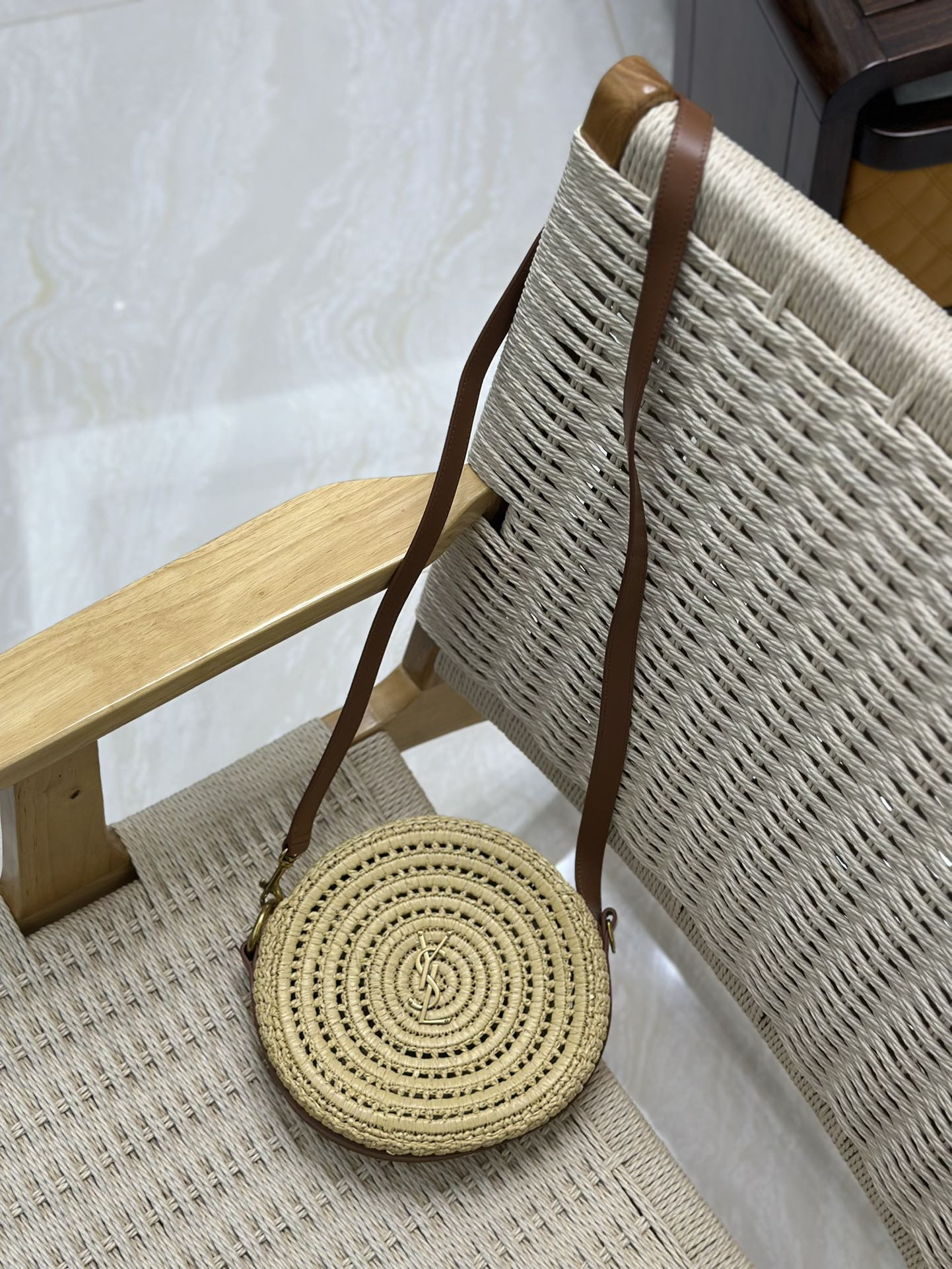 YSL ROUND BAG IN RAFFIA AND VEGETABLE-TANNED LEATHER Color Natural