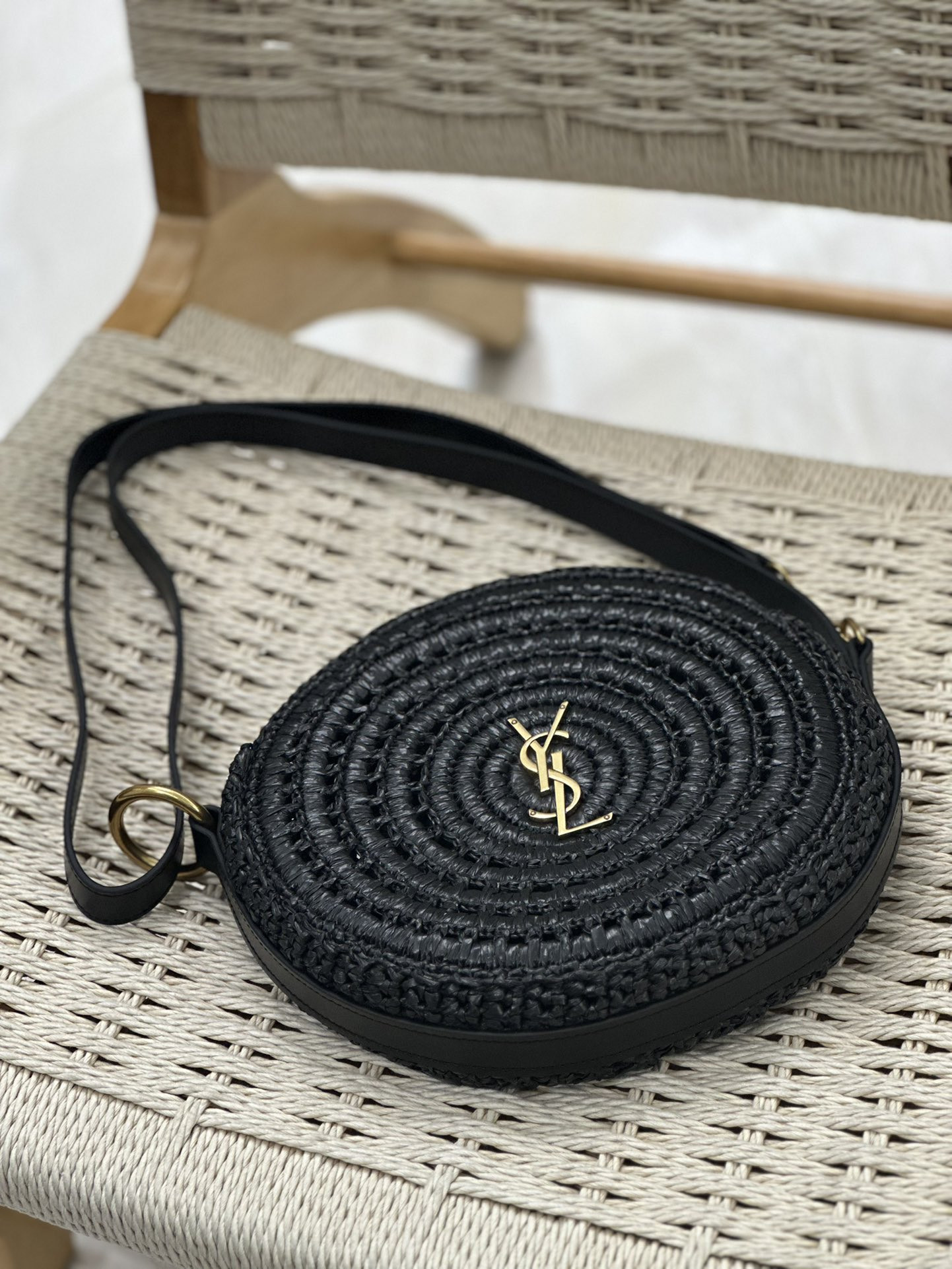 YSL ROUND BAG IN RAFFIA AND VEGETABLE-TANNED LEATHER Color Black