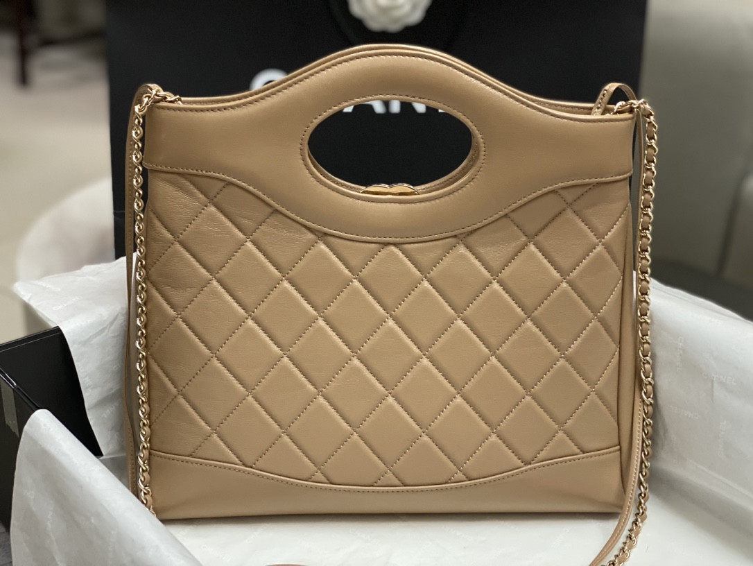 CHANEL SHOPPING BAG Shiny Lambskin & Gold-Tone Metal 11.7 × 11.3 × 3.5 in