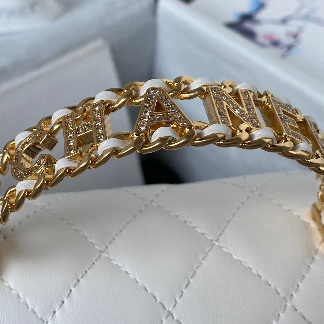 Chanel MINI CLASSIC HANDBAG WITH TOP HANDLE 12 × 20 × 6 CM