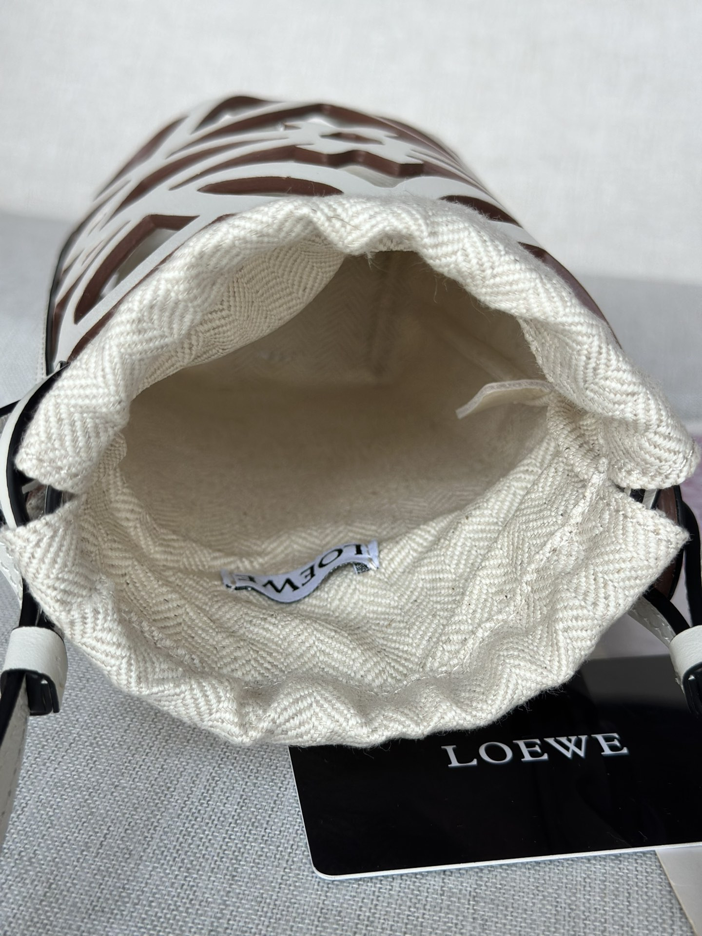 LOEWE Anagram cut-out pocket in classic calfskin and canvas 20x11x8cm