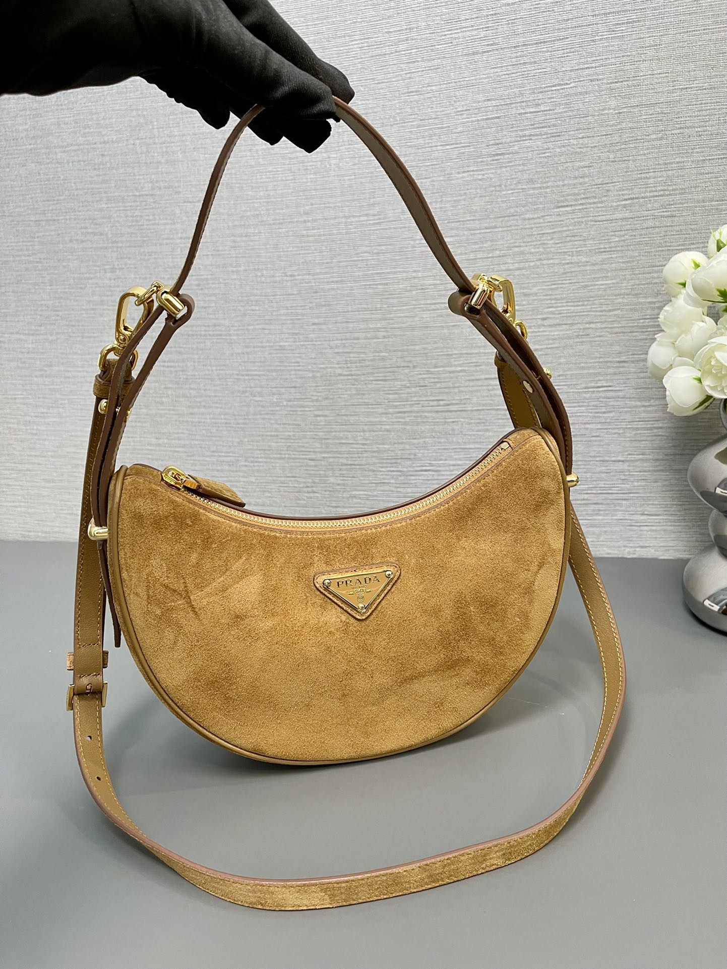 Prada Arqué suede shoulder bag 22.5x18.5x6.5cm