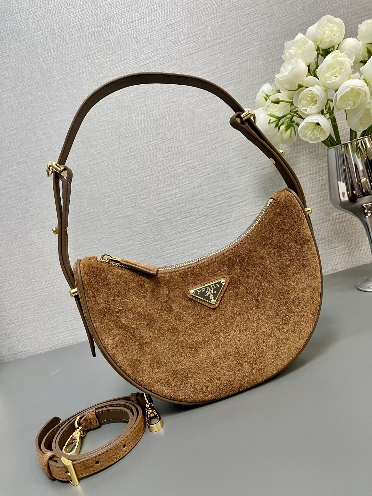 Prada Arqué suede shoulder bag 22.5x18.5x6.5cm