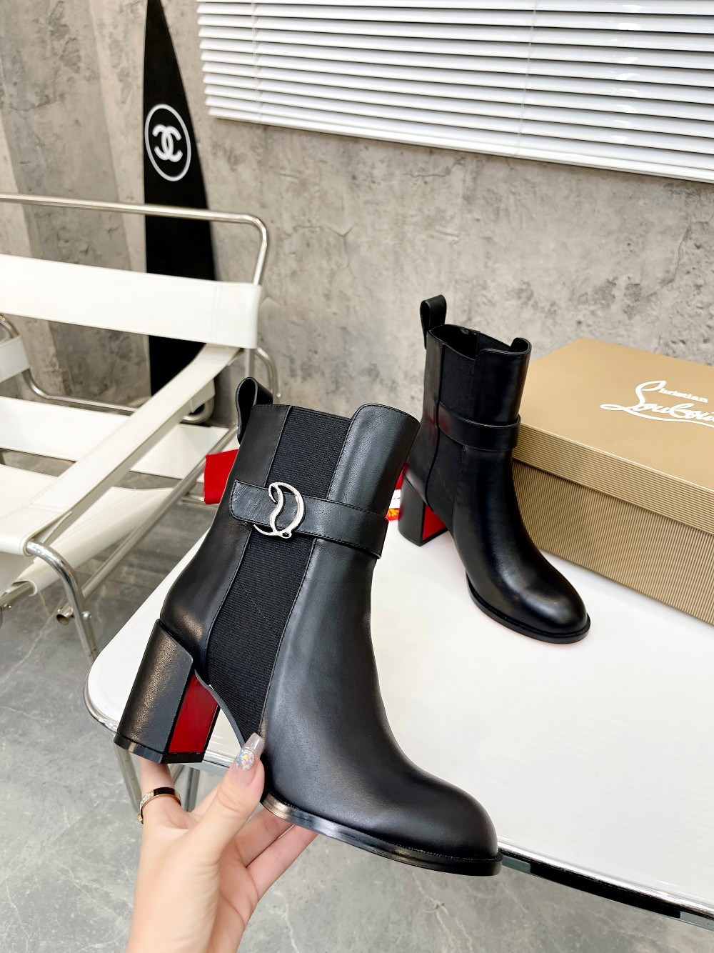 UA Christian Louboutin (CL) launched a new collection of chunky heeled platform boots