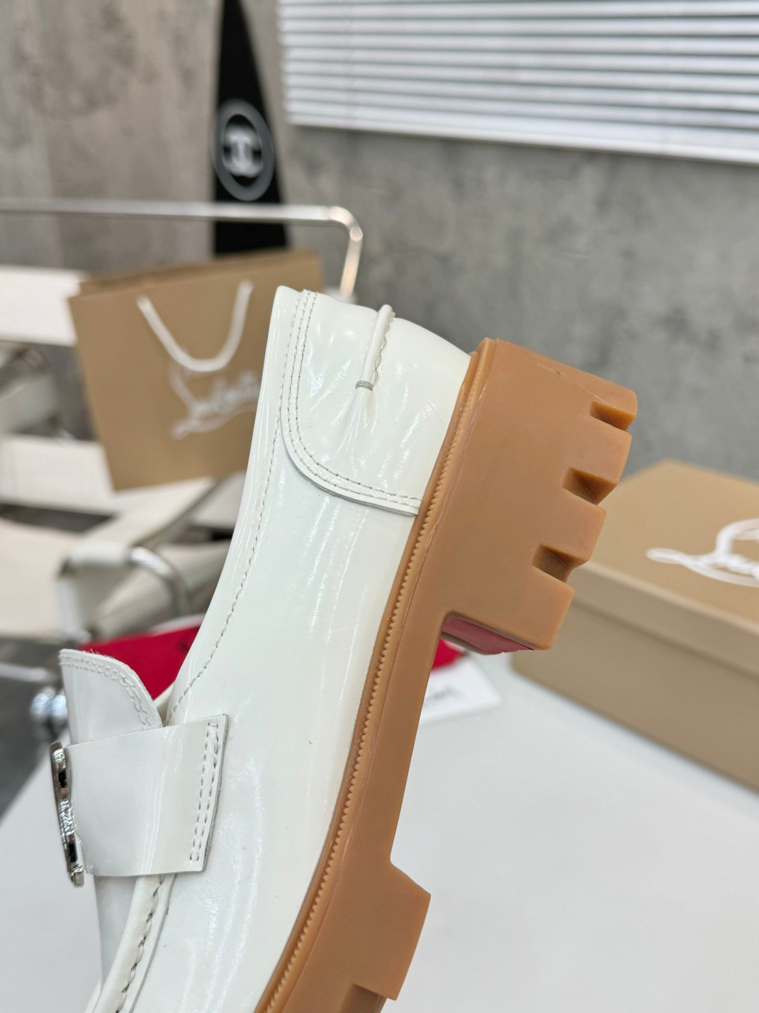 UA Christian Louboutin(CL) logo design,the latest runway version of the red-soled shoes