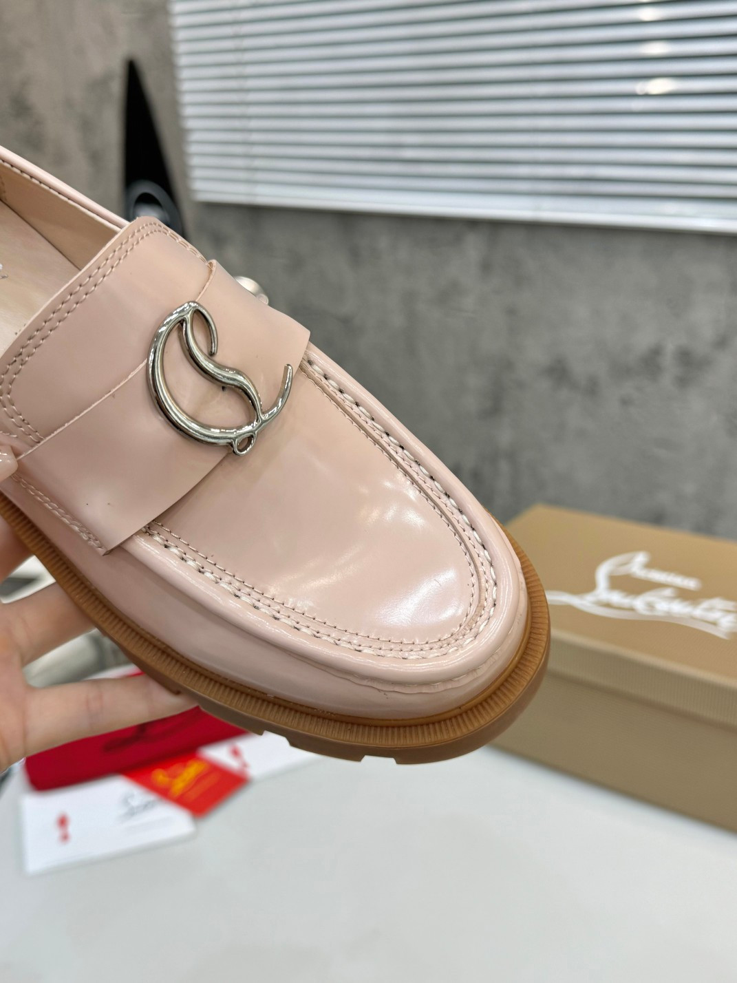 UA Christian Louboutin(CL) logo design,the latest runway version of the red-soled shoes