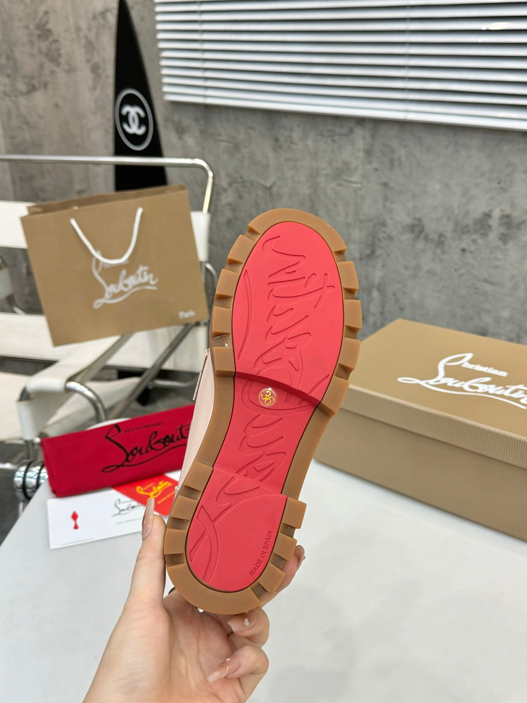 UA Christian Louboutin(CL) logo design,the latest runway version of the red-soled shoes