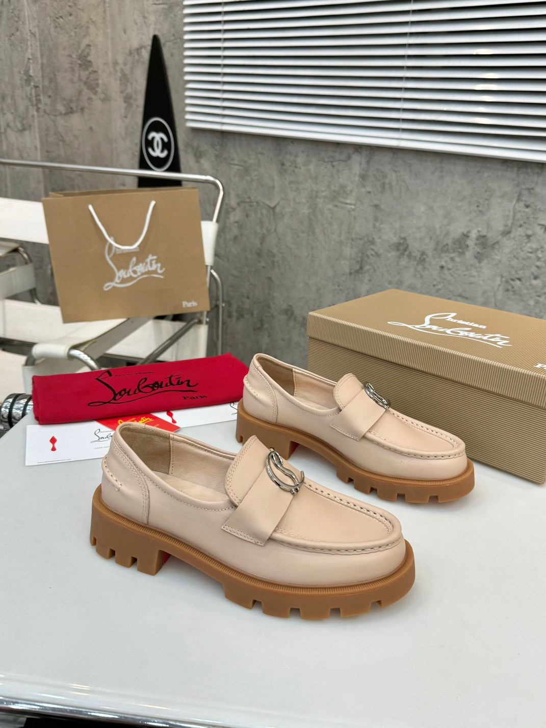 UA Christian Louboutin(CL) logo design,the latest runway version of the red-soled shoes