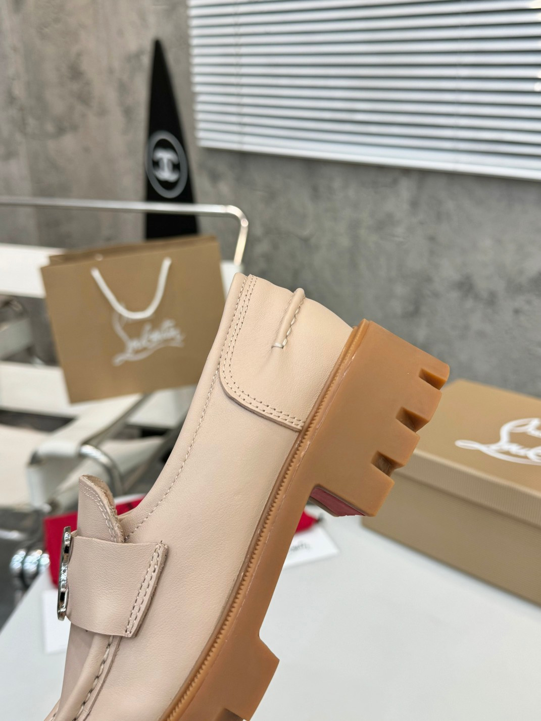 UA Christian Louboutin(CL) logo design,the latest runway version of the red-soled shoes