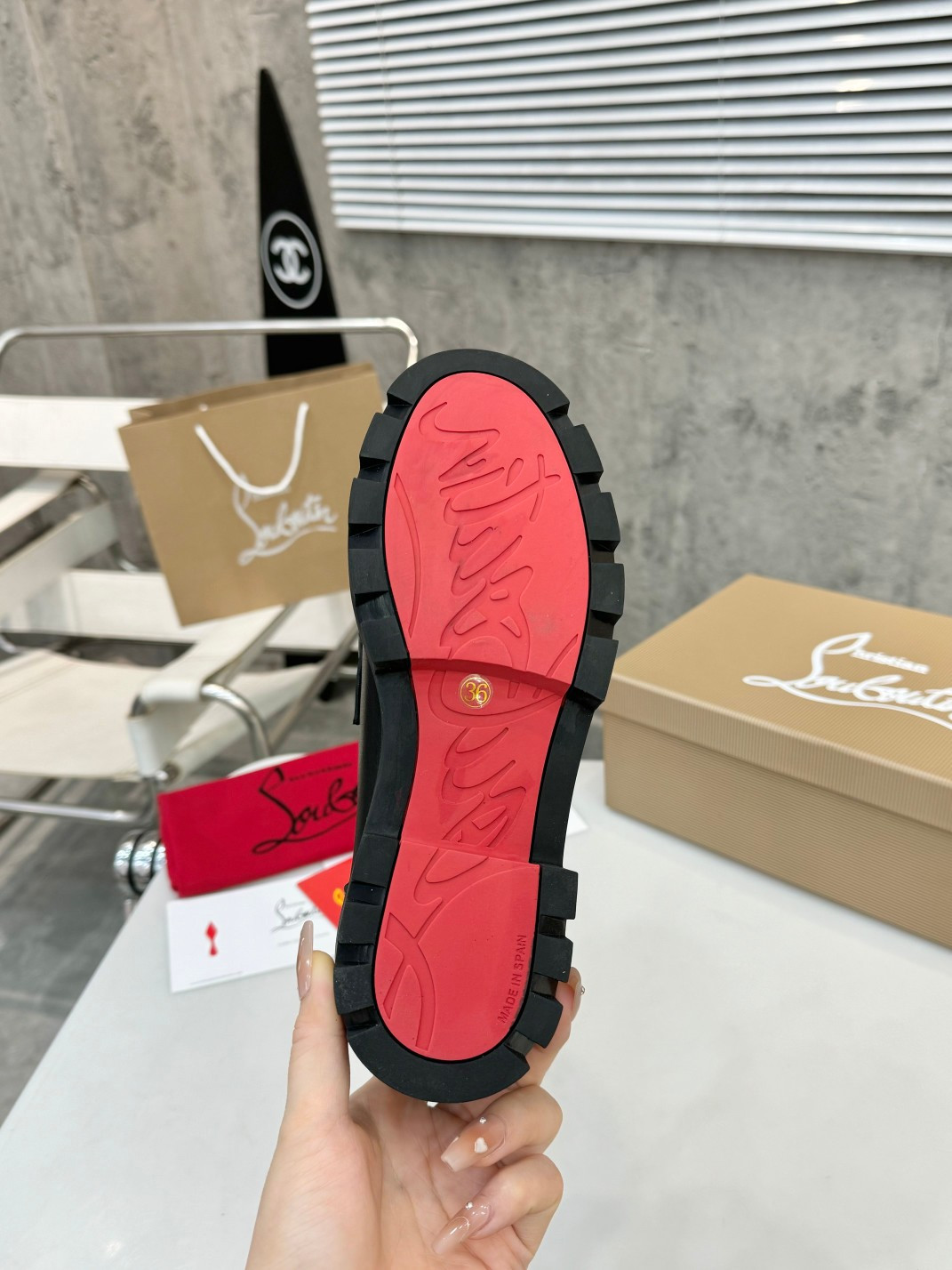 UA Christian Louboutin(CL) logo design,the latest runway version of the red-soled shoes