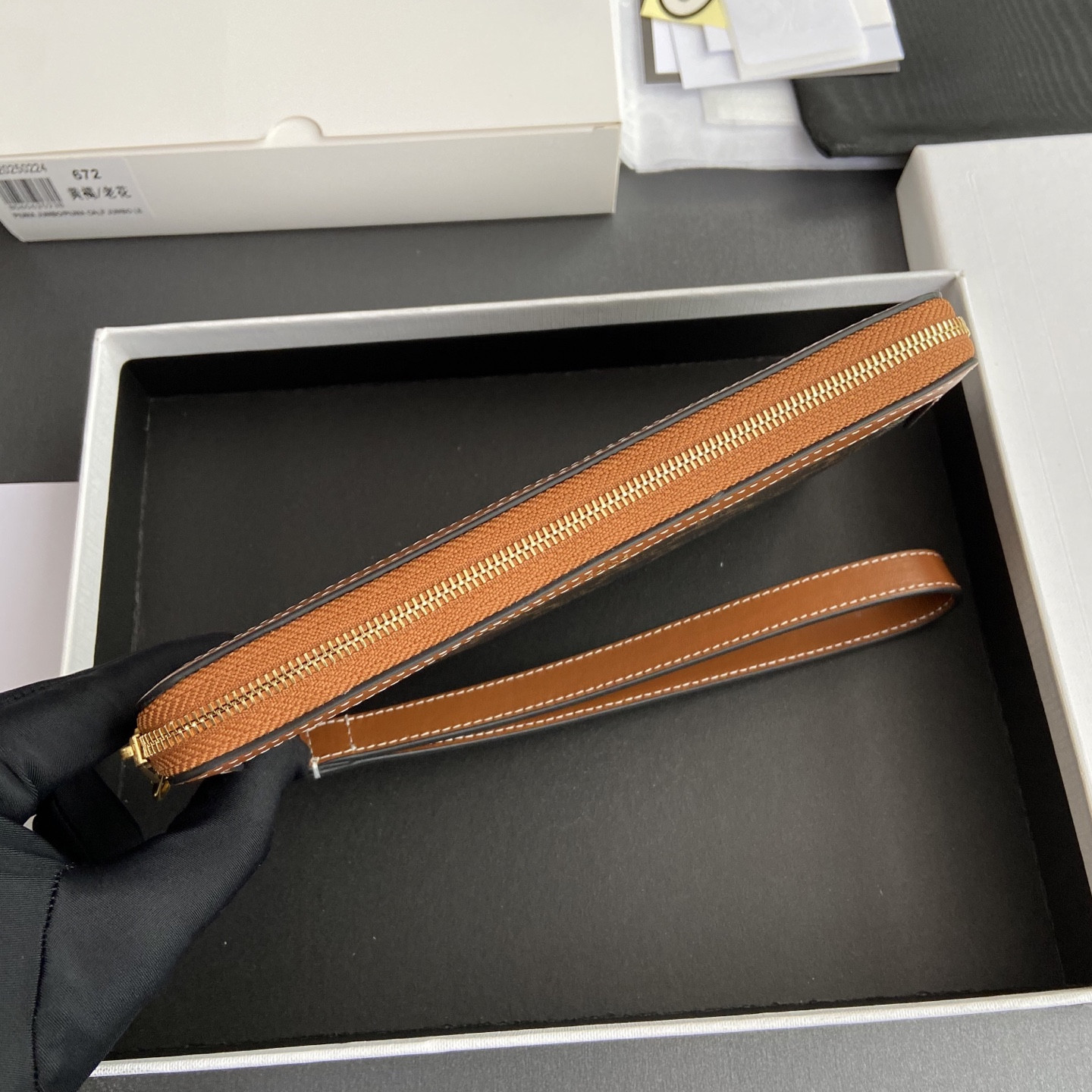 Celine LONG POUCH WITH STRAP in triomphe canvas and calfskin 21.5x11.5x1cm